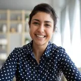 woman with navy button down shirt